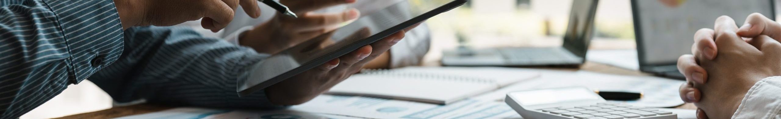 business adviser meeting to analyze and discuss the situation on the financial report